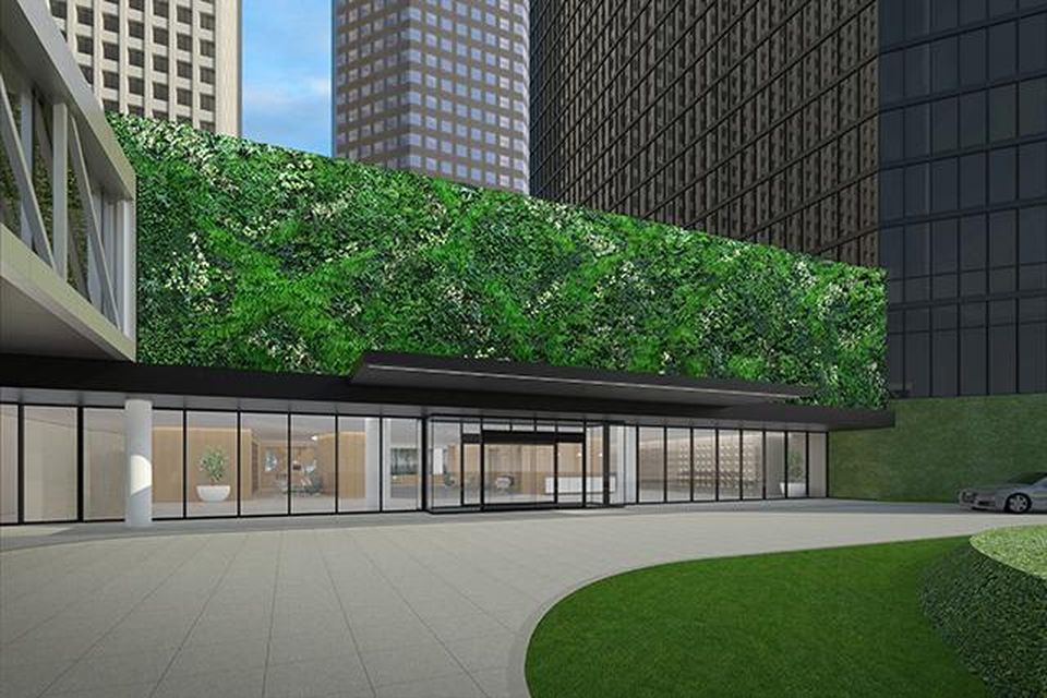 A living wall above the entry is one way the hotel has modernized its mood.